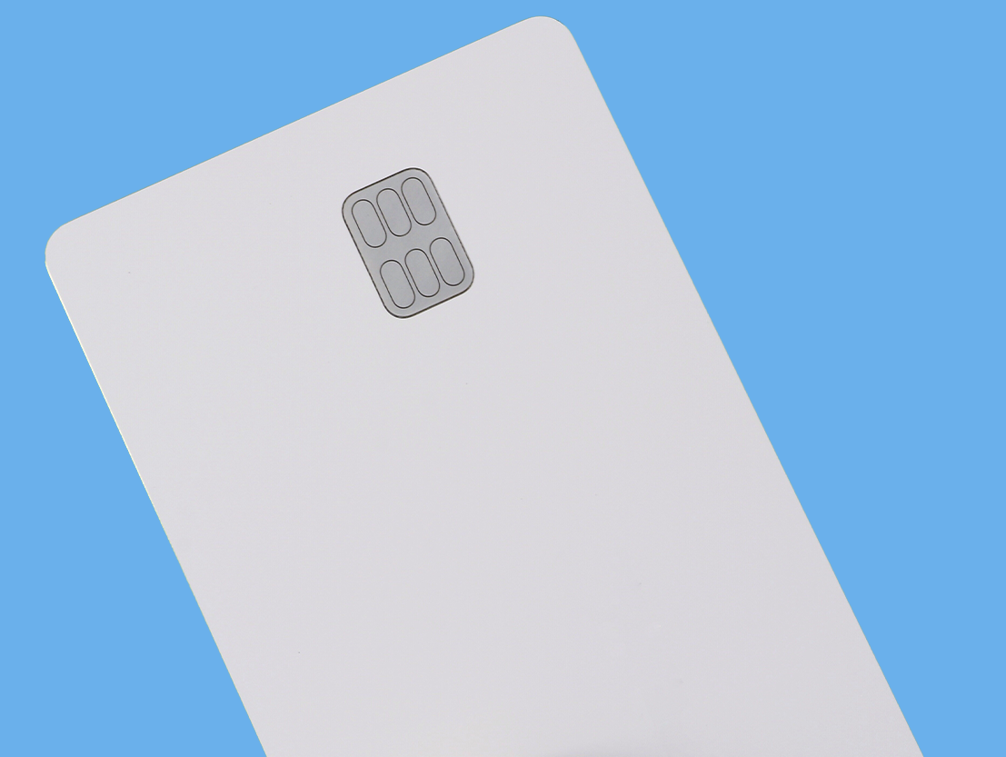 blank credit card against blue background